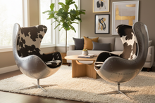 Modern Egg Chair in Cowhide Pattern – Luxury Swivel Accent Chair with Stainless Steel Base
