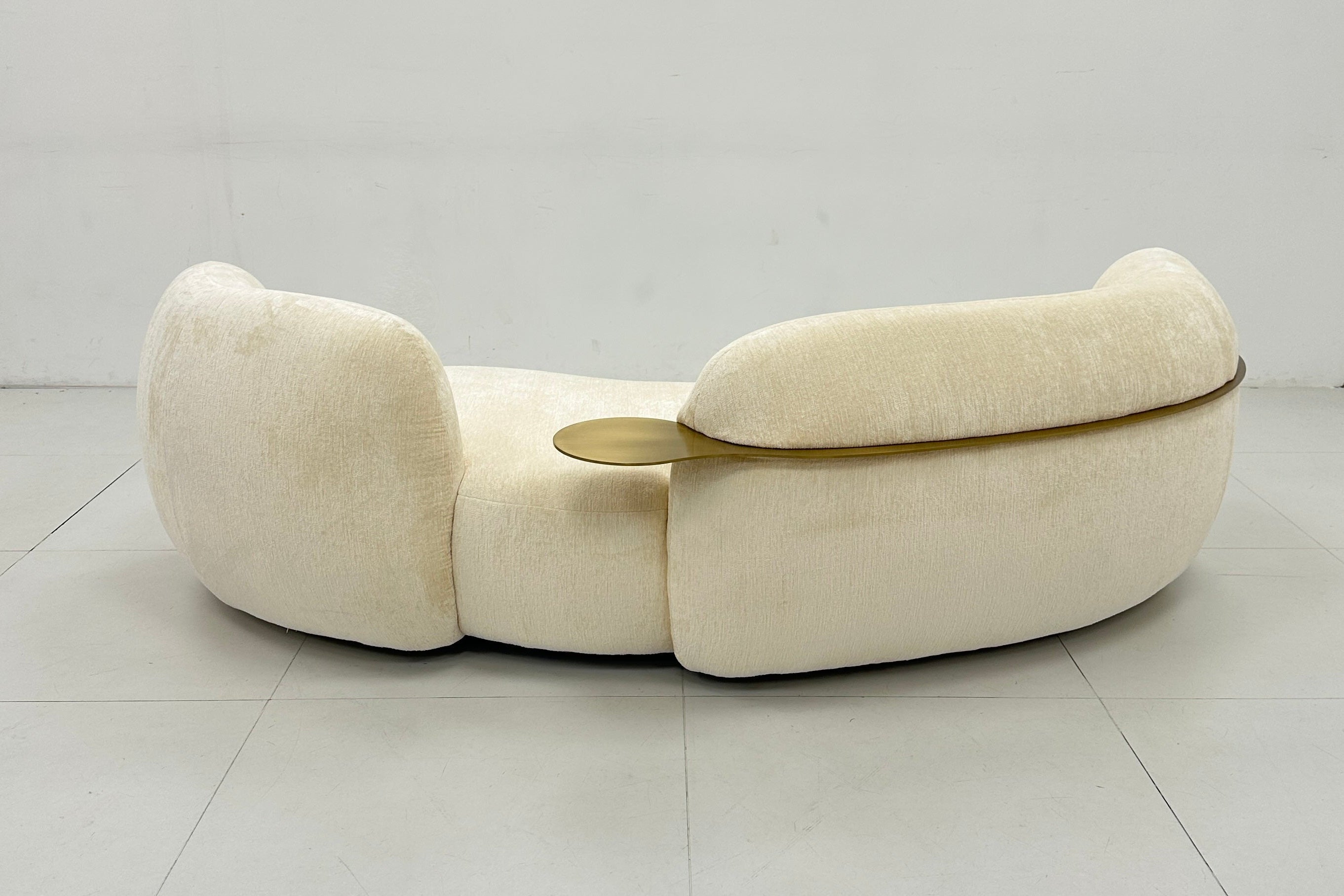 Curved Cream 3 Seater Sofa With Integrated Table In Stock
