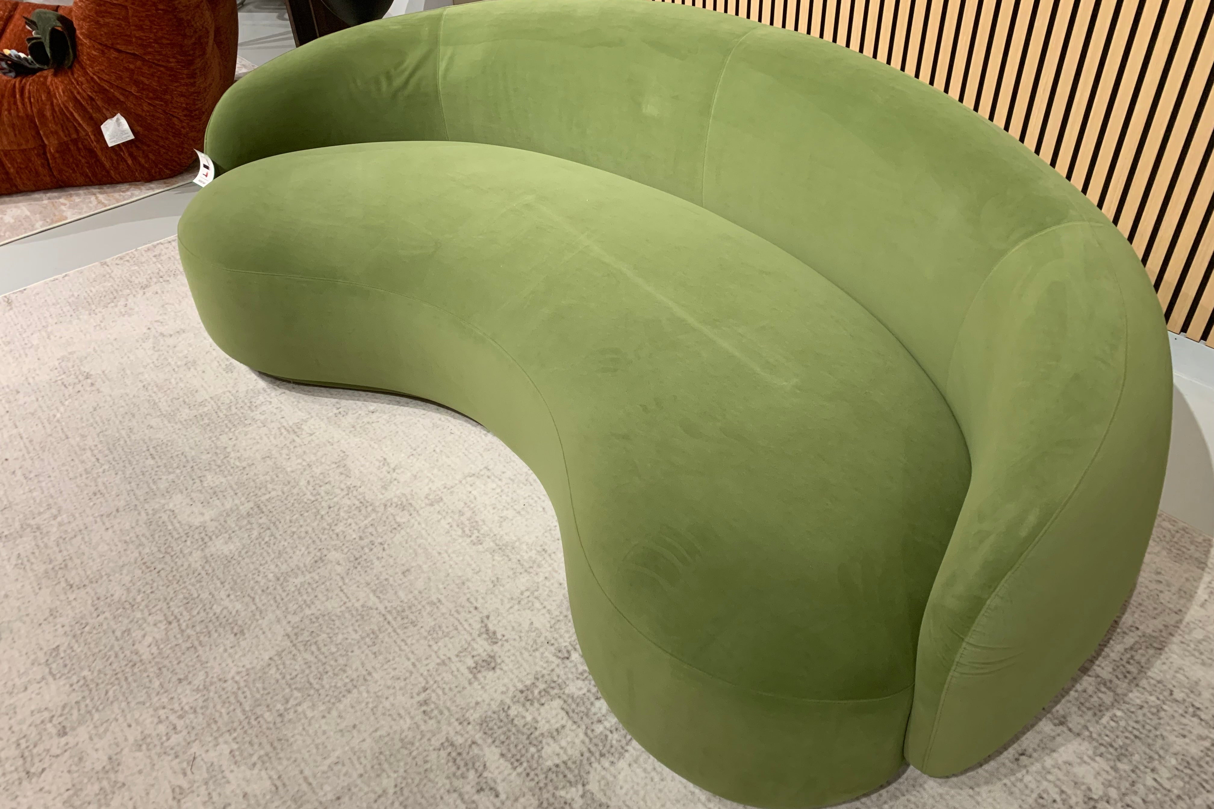 Green Velvet Curved Sofa Sculptural Upholstered Arc Couch for Contemporary Living Rooms in stock