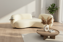 Curved Cream 3 Seater Sofa With Integrated Table In Stock